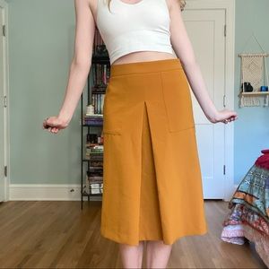 Structured yellow midi skirt